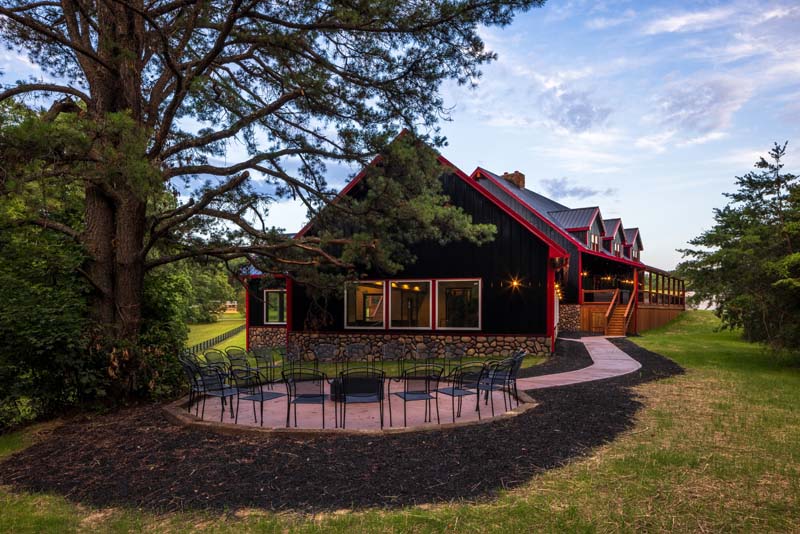 Concreted fire pit area — Black Eagle Lodge