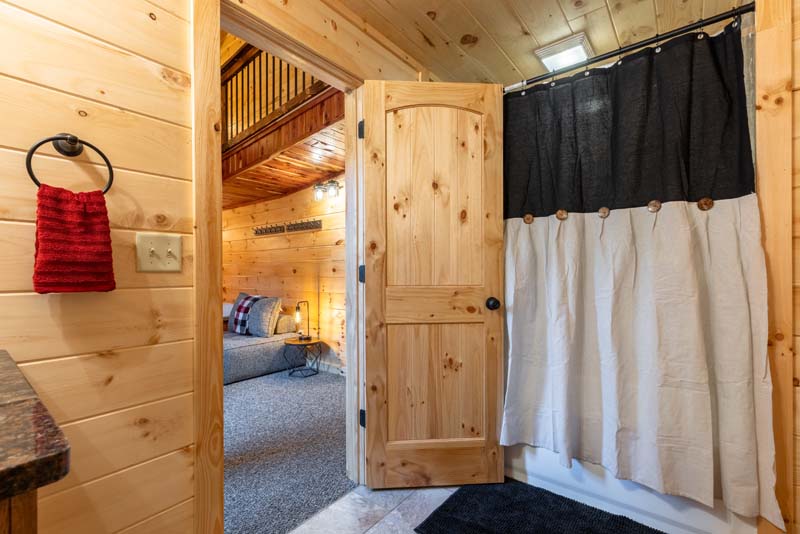 Bunk Room En-Suite Full Bath, With Tub_Shower, looking toward Lower Beds
