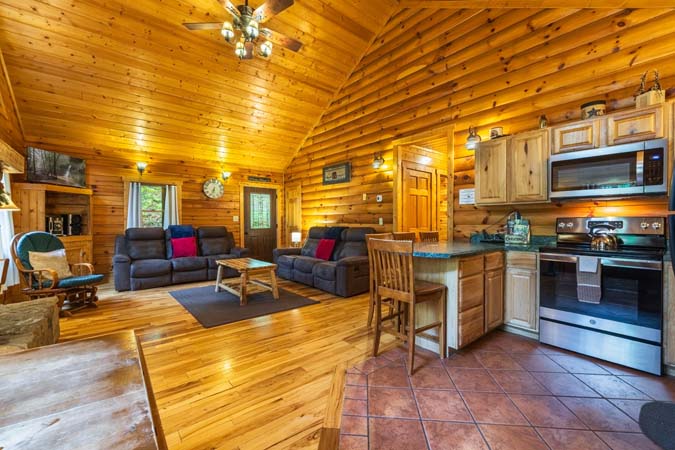 Open living area with the kitchen — Leaning Tree Cabin