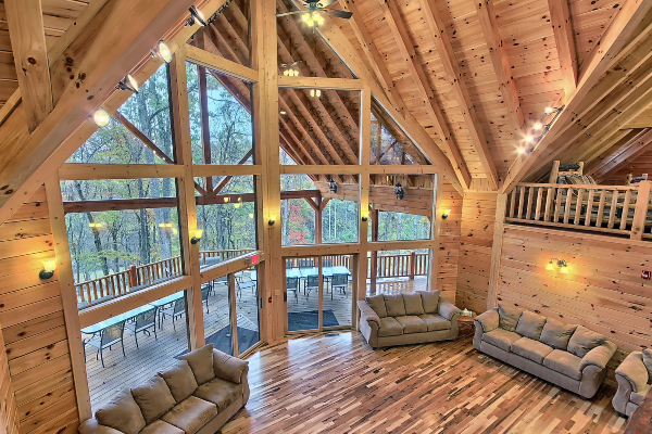 Wooden beams and log walls in the cabin living room