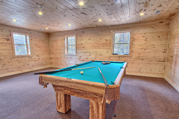 Rustic cabin game room with vintage charm