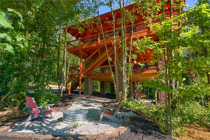 Enchanting log cabin tree house nestled among trees
