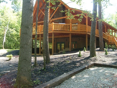 log cabin lodge with a deck