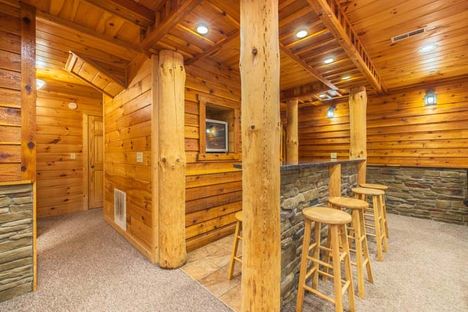 Lodge exterior glowing at dusk — Timber Ridge Lodge