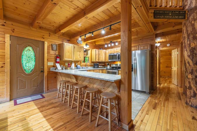 Group dining beside the fireplace — Timber Ridge Lodge