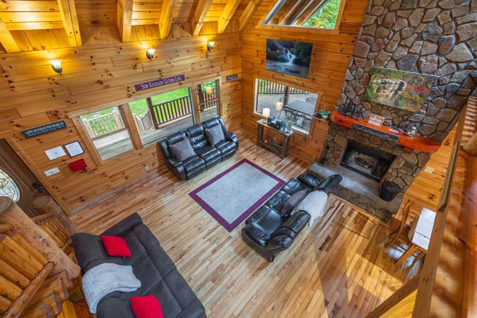 Queen log-bed bedroom — Timber Ridge Lodge