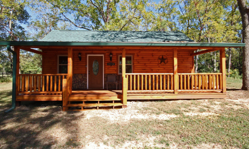 sunny day cabin with wrap around porch