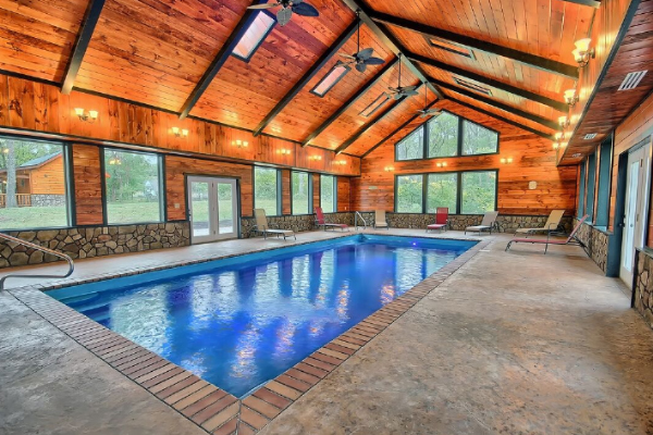 Inviting log cabin with an indoor swimming pool